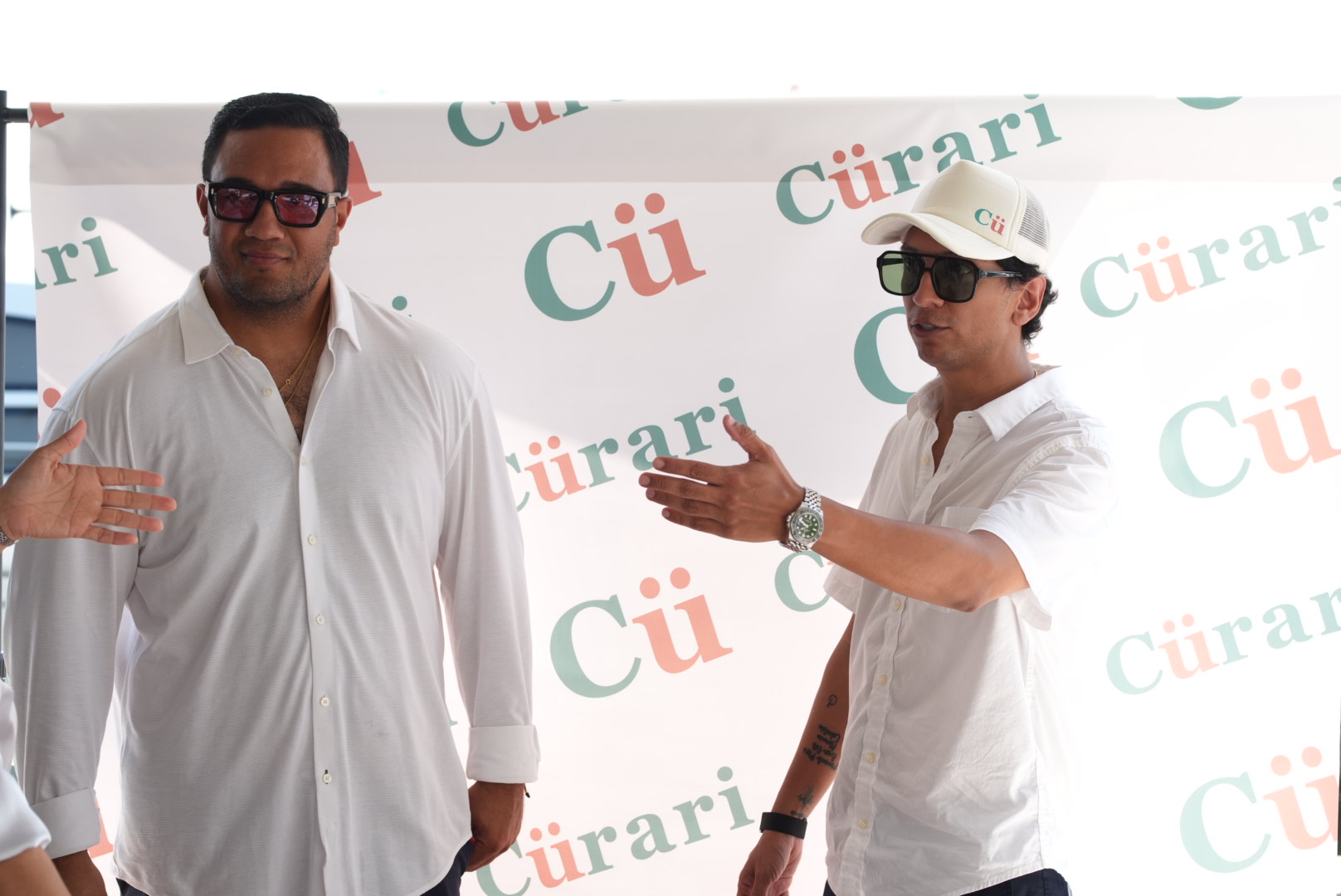 Diego Urquijo speaking at the Cürari event in Miami